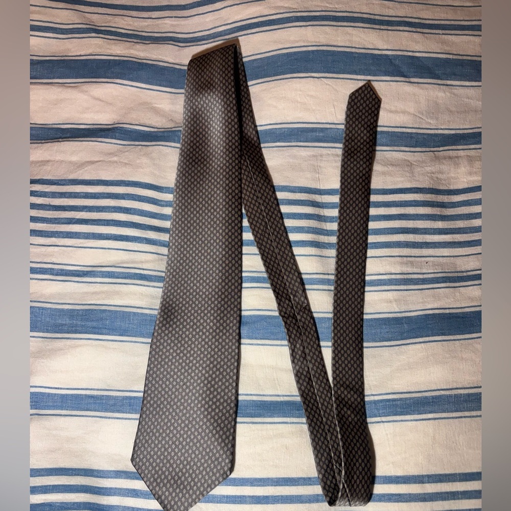 Grey tie with dot pattern
